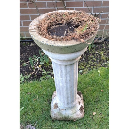 11 - A reconstituted stone bird bath on column base. 74 h x 36cm d.