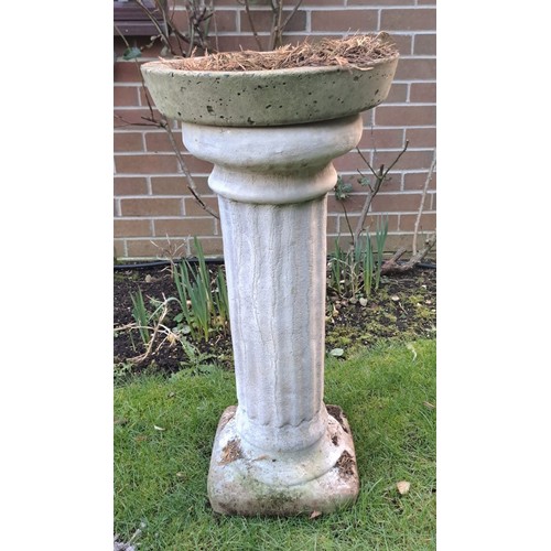 11 - A reconstituted stone bird bath on column base. 74 h x 36cm d.