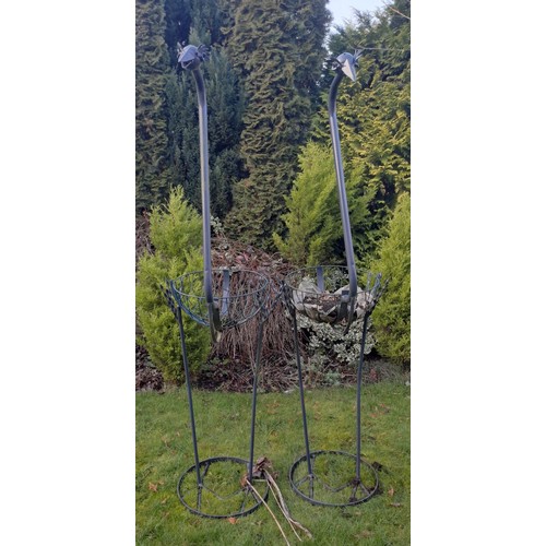 6 - Two metal bird garden planters. 186 h x 50 w x 55cm d.