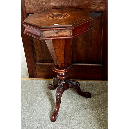 26A - A 19thC walnut work table with tripod base. 72cm h.