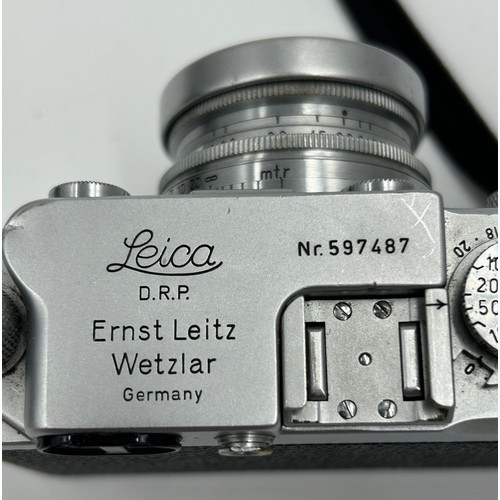 A Leica D.R.P Ernst Leitz Wetzlar camera No.597487 with Leitz
