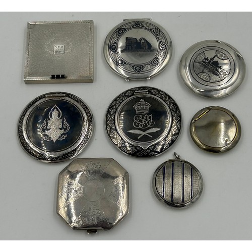 A mixture of white metal compacts to include one stamped 90 and ...