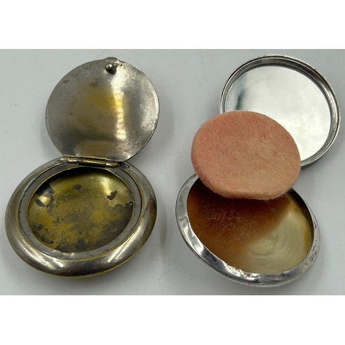 A mixture of white metal compacts to include one stamped 90 and ...