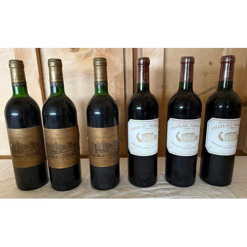 12 - Chateau Margaux Premier Grand Cru Classe Margaux. 2002. 3 x 75cl together with Chateau D'Issan Marga... 
