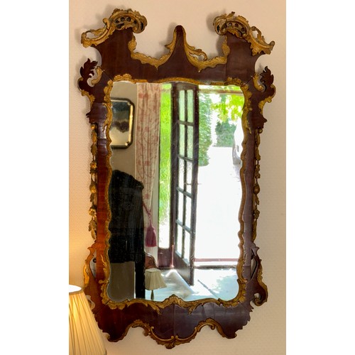 1284 - Mahogany and gilt fretwork mirror. 116cm x 69cm.