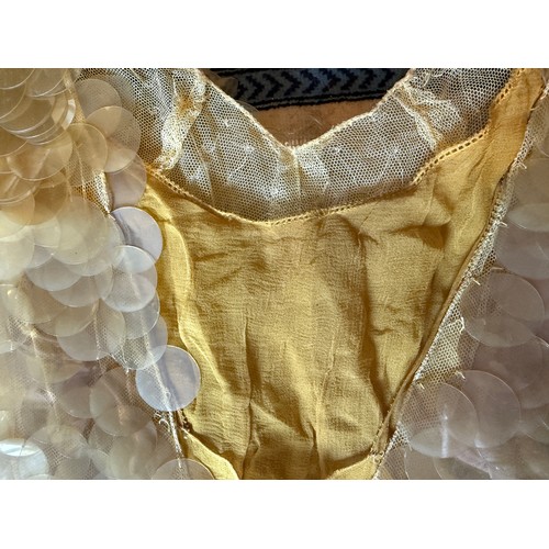 504 - A 1930's Peter Russell canary yellow sequinned bias cut dress of cotton tulle over a silk crepe bias... 