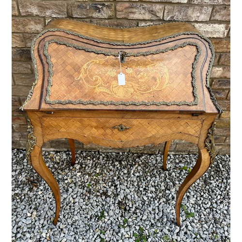 1 - A French style marquetry and parquetry ladies desk with cabriole legs, ormolu mounts and fitted draw... 