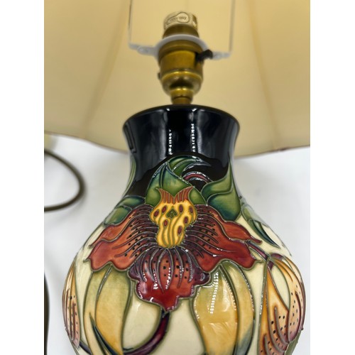 12 - A Moorcroft table lamp in Anna Lily pattern designed by Nicola Slaney 2001 paired with an original s... 