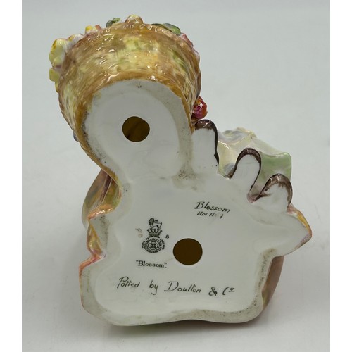 21 - A collection of Royal Doulton figures to include Blossom HN1109, A Stitch in Time HN2352, Autumn Bre... 