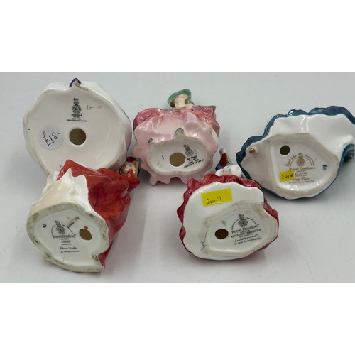 31 - A collection of Royal Doulton Figures to include Babie HN1679, Monica HN1467, Autumn Breezes HN2176,... 