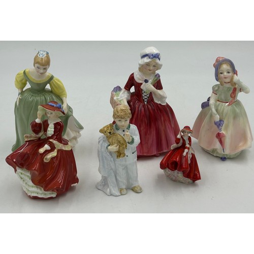 31 - A collection of Royal Doulton Figures to include Babie HN1679, Monica HN1467, Autumn Breezes HN2176,... 
