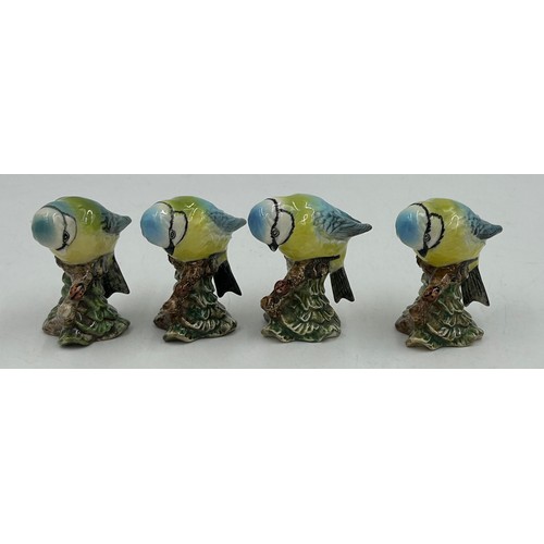 33 - A collection of Beswick birds to include barn owl 1046 19cm, 3 x small barn owls, cockatoo 1180, par... 