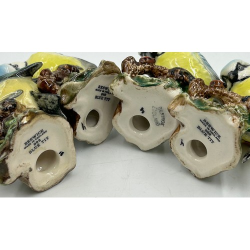 33 - A collection of Beswick birds to include barn owl 1046 19cm, 3 x small barn owls, cockatoo 1180, par... 