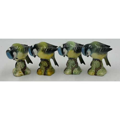 33 - A collection of Beswick birds to include barn owl 1046 19cm, 3 x small barn owls, cockatoo 1180, par... 