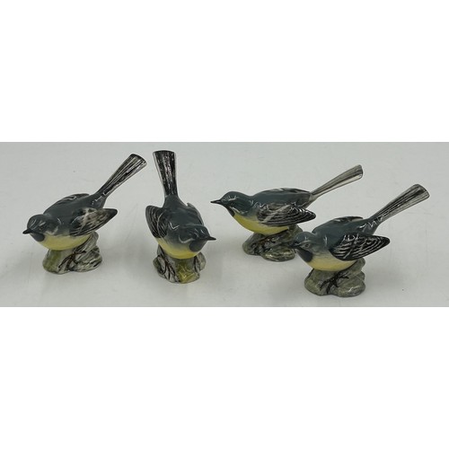 33 - A collection of Beswick birds to include barn owl 1046 19cm, 3 x small barn owls, cockatoo 1180, par... 