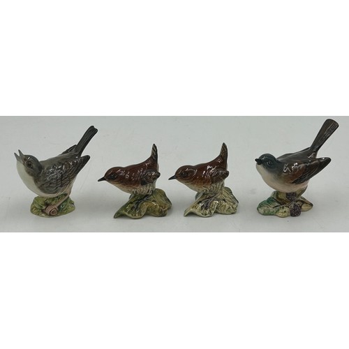 33 - A collection of Beswick birds to include barn owl 1046 19cm, 3 x small barn owls, cockatoo 1180, par... 