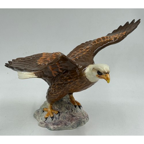 34 - A collection of Beswick birds to include Pheasant 849, Pigeon 1383, Cuckoo 2315, Jay 2417, Pair of G... 