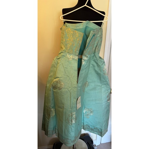 Doris Geddes-Raffles Hotel-Singapore. Aqua/gold sari cotton jacquard  strapless dress with gold woven