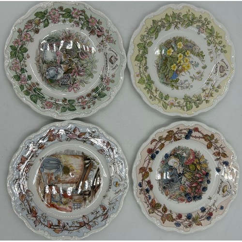 40 - A selection of ceramics to include Disney: Winnie the Pooh clock, 2 x large mugs, 2 x Wedgwood Peter... 