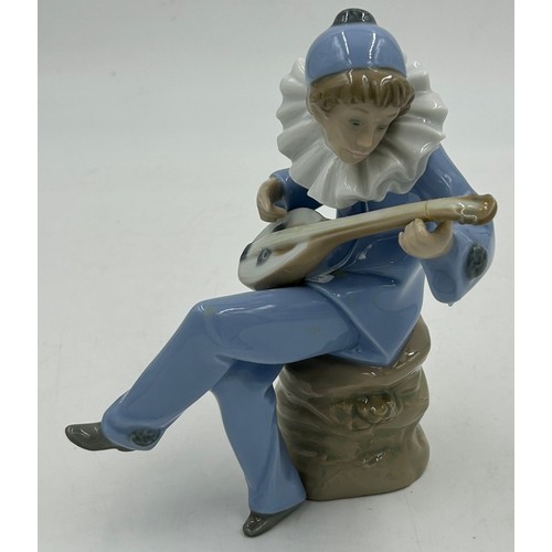43 - Two large Lladro figures to include 'Ballerina with Jester' Daisa 1977 length 36cm, 'Privilege' Lady... 