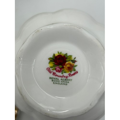 45 - A Royal Albert Country Roses part tea service to include cake plate, 6 x side small plates, 6 x sauc... 