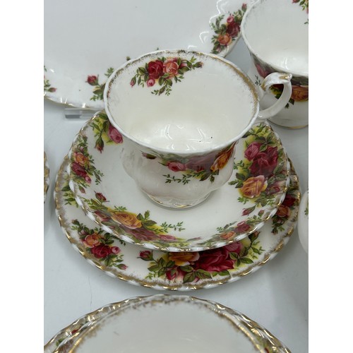 45 - A Royal Albert Country Roses part tea service to include cake plate, 6 x side small plates, 6 x sauc... 