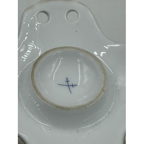 49 - Ceramics to include a pair of Continental pedestal comports with crossed sword mark to base, a pierc... 
