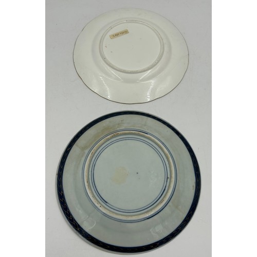 49 - Ceramics to include a pair of Continental pedestal comports with crossed sword mark to base, a pierc... 