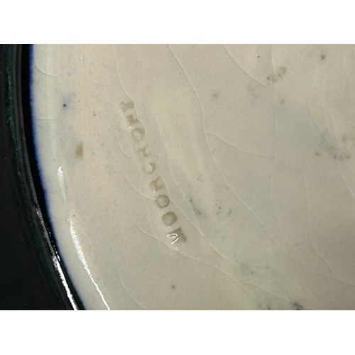 50 - Two Moorcroft Anemone patterned plates one in the green colourway 31cm d and one in blue 25.5cm d. B... 