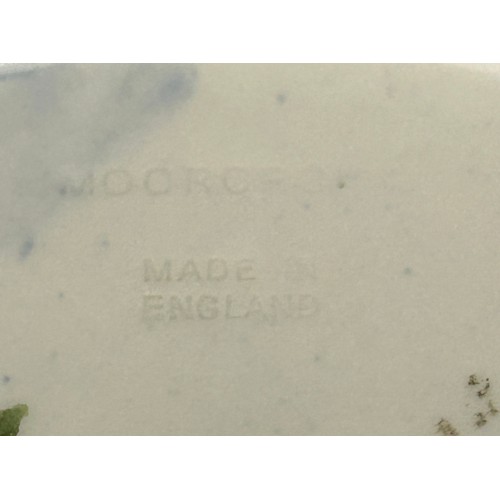 50 - Two Moorcroft Anemone patterned plates one in the green colourway 31cm d and one in blue 25.5cm d. B... 