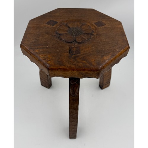 11 - Kingfisherman, Herbert Bird. A three legged oak stool with adzed decoration to legs and Yorkshire Ro... 