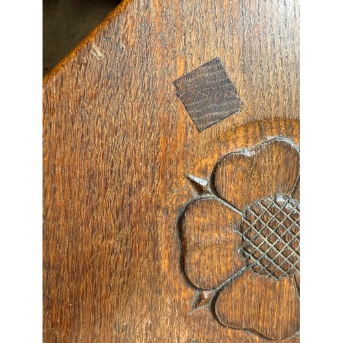 11 - Kingfisherman, Herbert Bird. A three legged oak stool with adzed decoration to legs and Yorkshire Ro... 