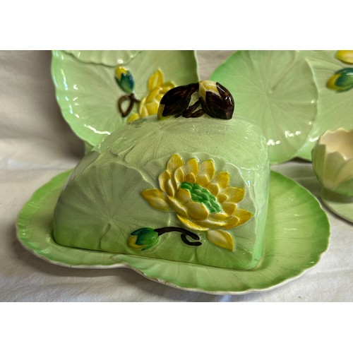 57 - A collection of Water Lily Carlton Ware comprising of a cheese dish, footed bowl, jug, strainer dish... 