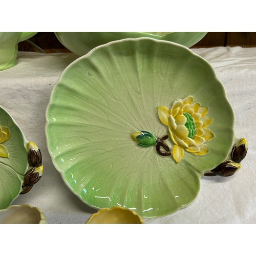 57 - A collection of Water Lily Carlton Ware comprising of a cheese dish, footed bowl, jug, strainer dish... 