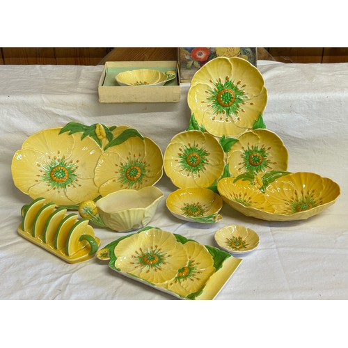 58 - A collection of Buttercup Carlton Ware items to include dishes, sauce boat, bowls, serving dishes to... 