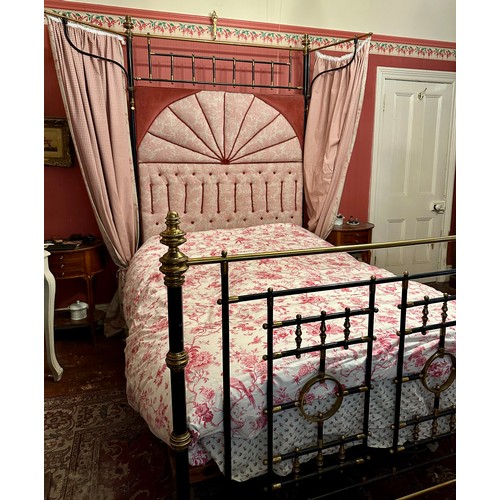 5 - A Victorian brass and iron half tester brass and iron double bedstead 4’6” w x 6’4” l with metal spr... 