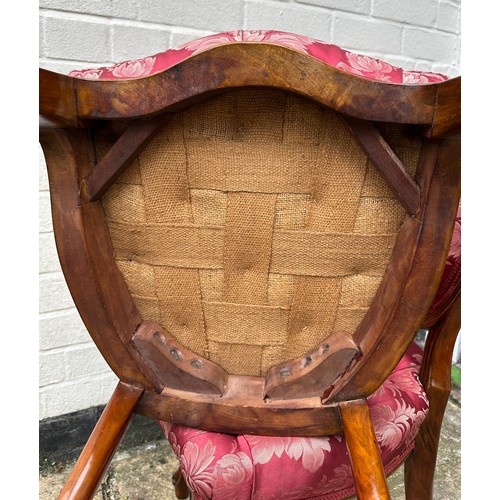 6 - A pair of Victorian mahogany framed salon chairs with floral carving. 86 h x 44 w x 44cm d. Height t... 