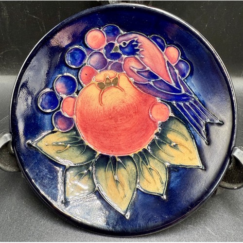 22 - A Moorcroft ‘Finches & Fruit’ pattern dish, 11.5cm diameter. Designed by Sally Tuffin.