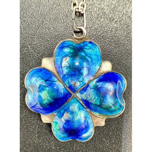 35 - A silver and enamel four leaf clover pendant, Birmingham 1909, on a sterling silver chain. Length of... 