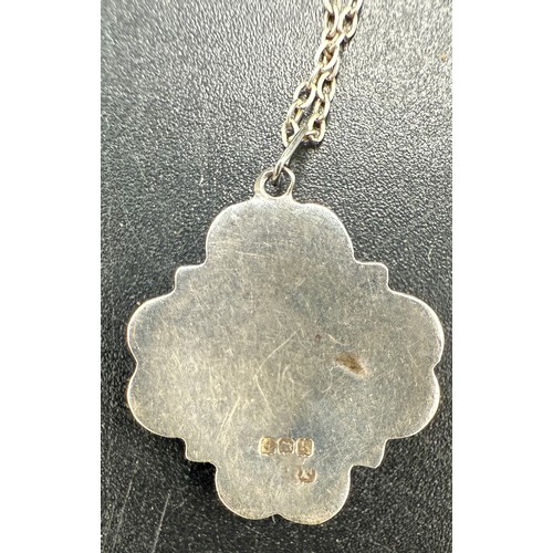 35 - A silver and enamel four leaf clover pendant, Birmingham 1909, on a sterling silver chain. Length of... 