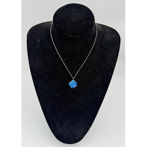 35 - A silver and enamel four leaf clover pendant, Birmingham 1909, on a sterling silver chain. Length of... 