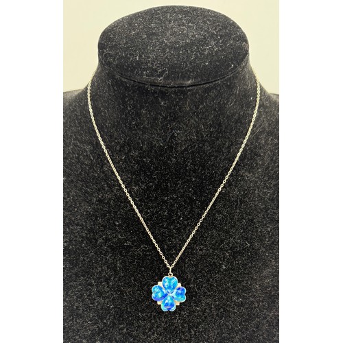 35 - A silver and enamel four leaf clover pendant, Birmingham 1909, on a sterling silver chain. Length of... 