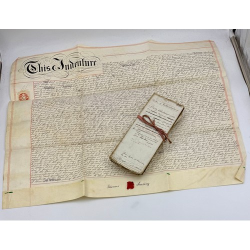 55 - An 1876 sealed indenture together with various early 19thC deeds and accounts concerning Alnwick and... 