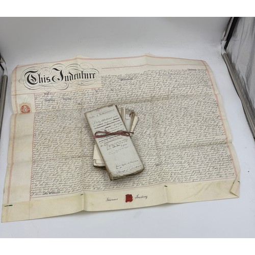 55 - An 1876 sealed indenture together with various early 19thC deeds and accounts concerning Alnwick and... 
