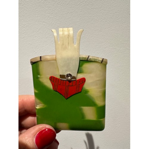 13 - Two vintage celluloid Art Deco 1920's/1930's cigarette cases both modelled as purses, green case wit... 