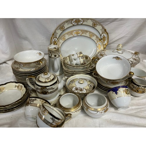 216 - A Noritake part dinner service pattern 44318 to include 2 x serving plates largest 35cm, lidded ture... 