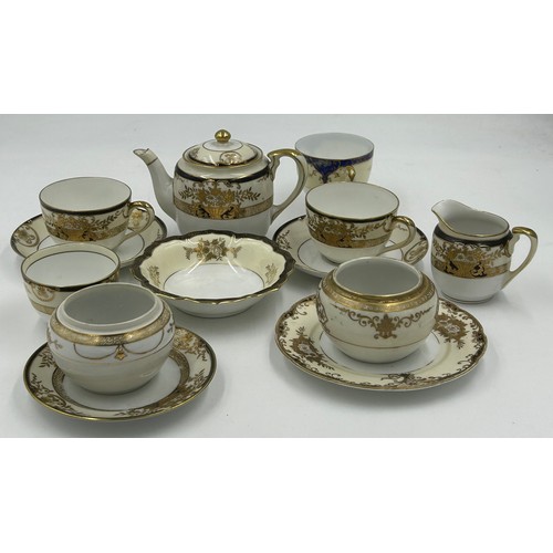 216 - A Noritake part dinner service pattern 44318 to include 2 x serving plates largest 35cm, lidded ture... 