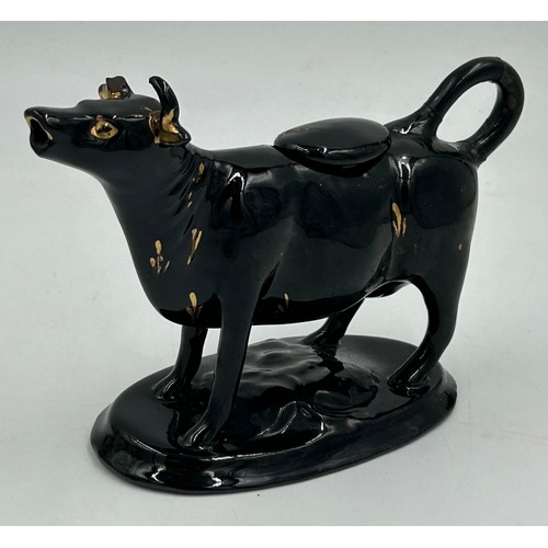 238 - A quantity of mainly 19thC ceramics to include Staffordshire figures, Uncle Tom and Eva and pastille... 