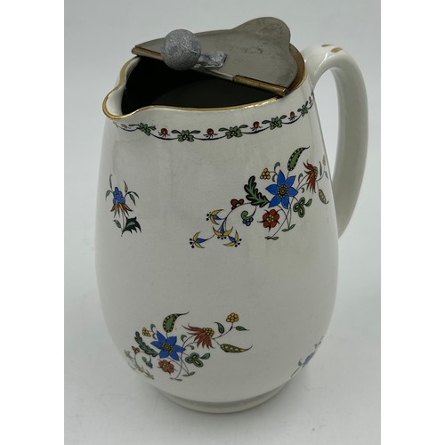 214 - A Shelley Chelsea pattern tea service to include a square cake plate, a teapot with stand, a lidded ... 