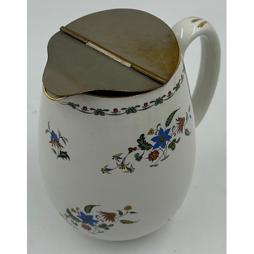 214 - A Shelley Chelsea pattern tea service to include a square cake plate, a teapot with stand, a lidded ... 